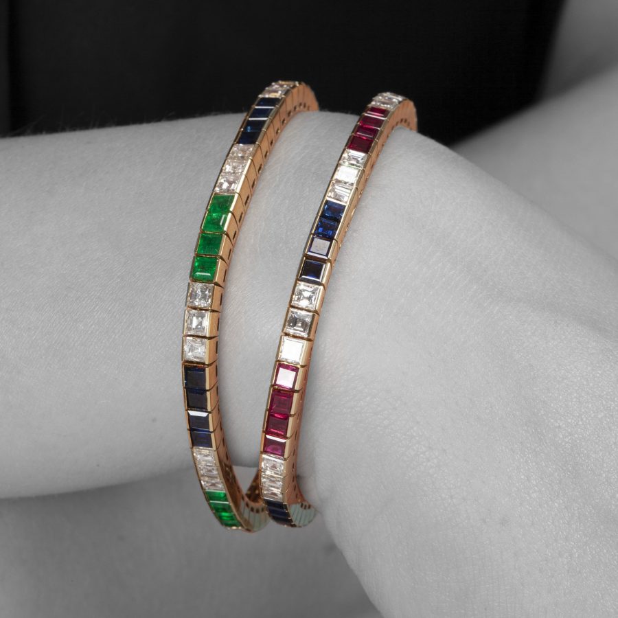 Bvlgari set van twee rivière armbanden diamant robijn saffier smaragd