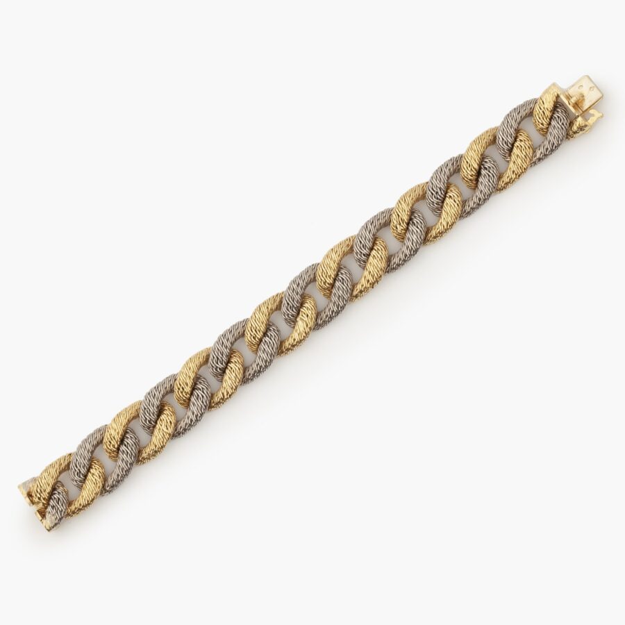 Armband bestaande uit schakels geweven gouddraad geel en witgoud door Georges Lenfant, Parijs, circa 1970