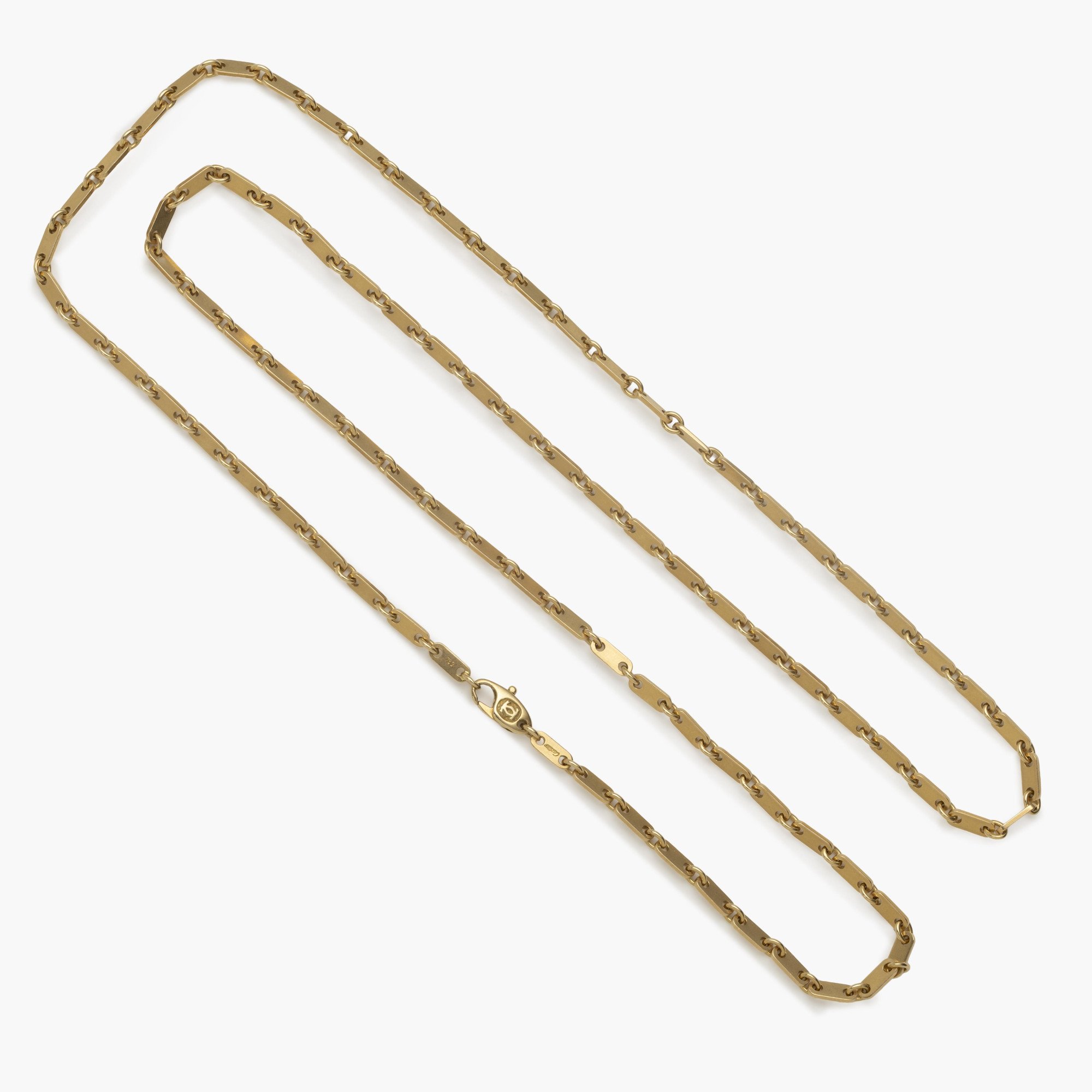 Een achttien karaat geelgouden collier ‘Fidelity’. Gesigneerd Cartier, vervaardigd omstreeks 1990 en genummerd. Met origineel etui.